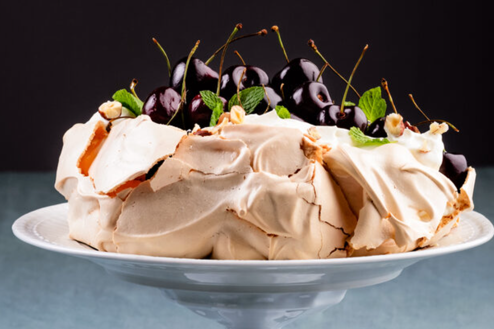 Cheats Pavlova with Fresh Cherries and Strawberry Gum Cream